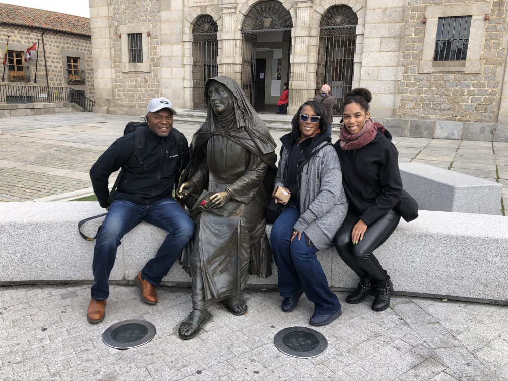 SaDé with her parents, Jeremiah and Tanaya Lewis, at the Convent of Santa Teresa in Ávila, Spain.
