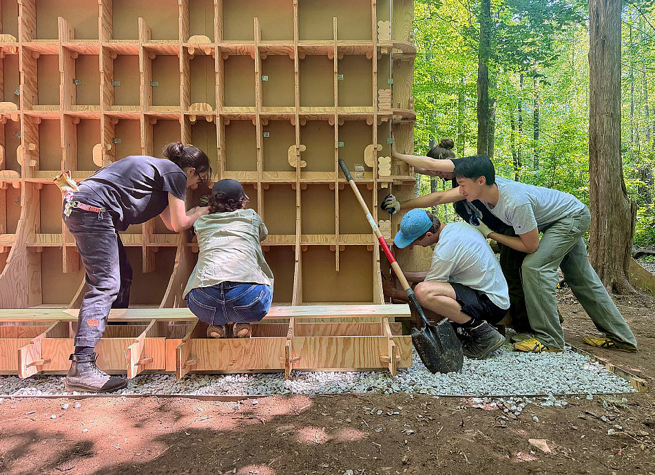 Syracuse team of students with faculty member Ekin Erar on the last day of build. 